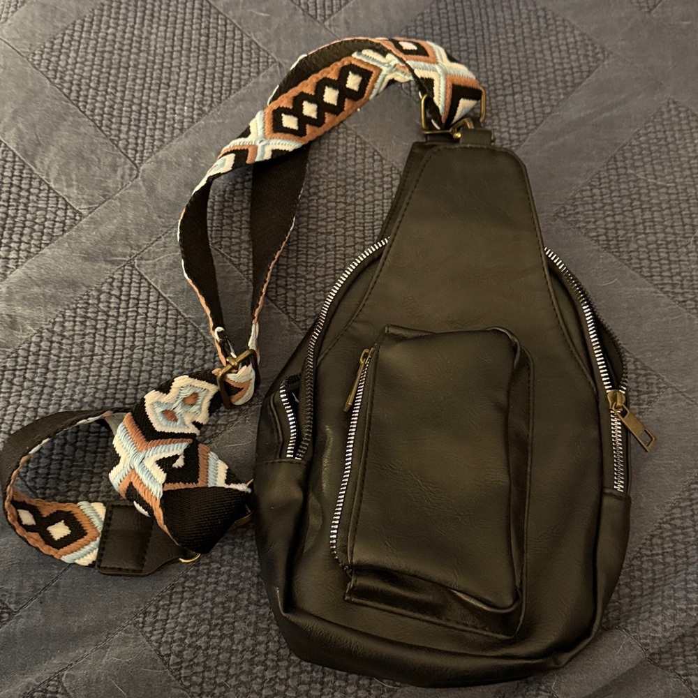 Stylish Black Sling Bag with Patterned Strap